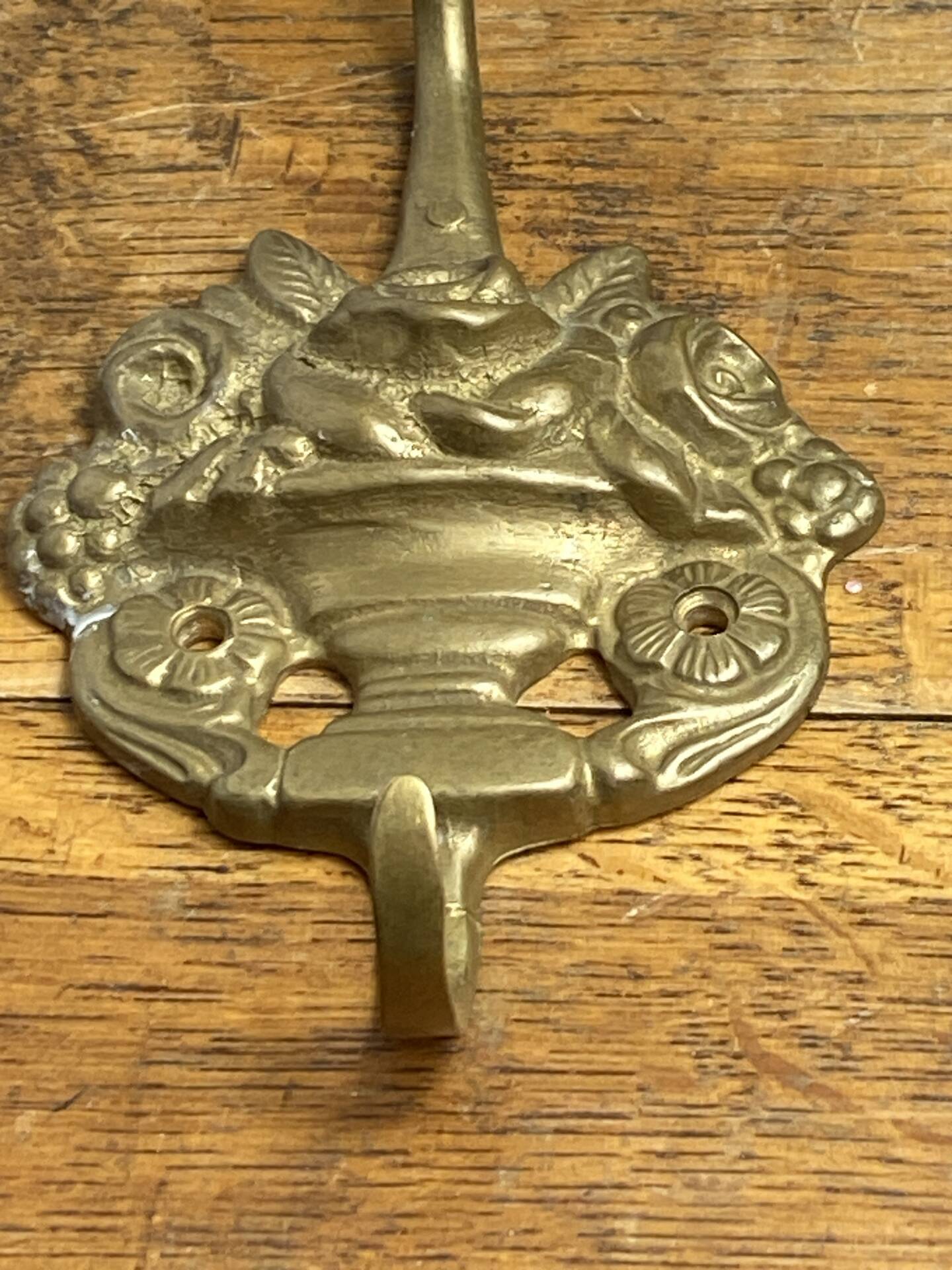 Wall-mounted brass hook
