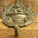 Wall-mounted brass hook