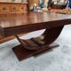 Art Deco dining table with a central cradle base from the 1930s.