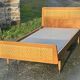 Read a vintage wooden and cane bed, with compass legs – mattress 80 × 190 cm.