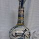 Vintage bottle vases in Talavera de la Reina earthenware.
