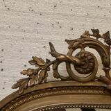 Louis XVI style mirror in wood and gilded stucco XIX century