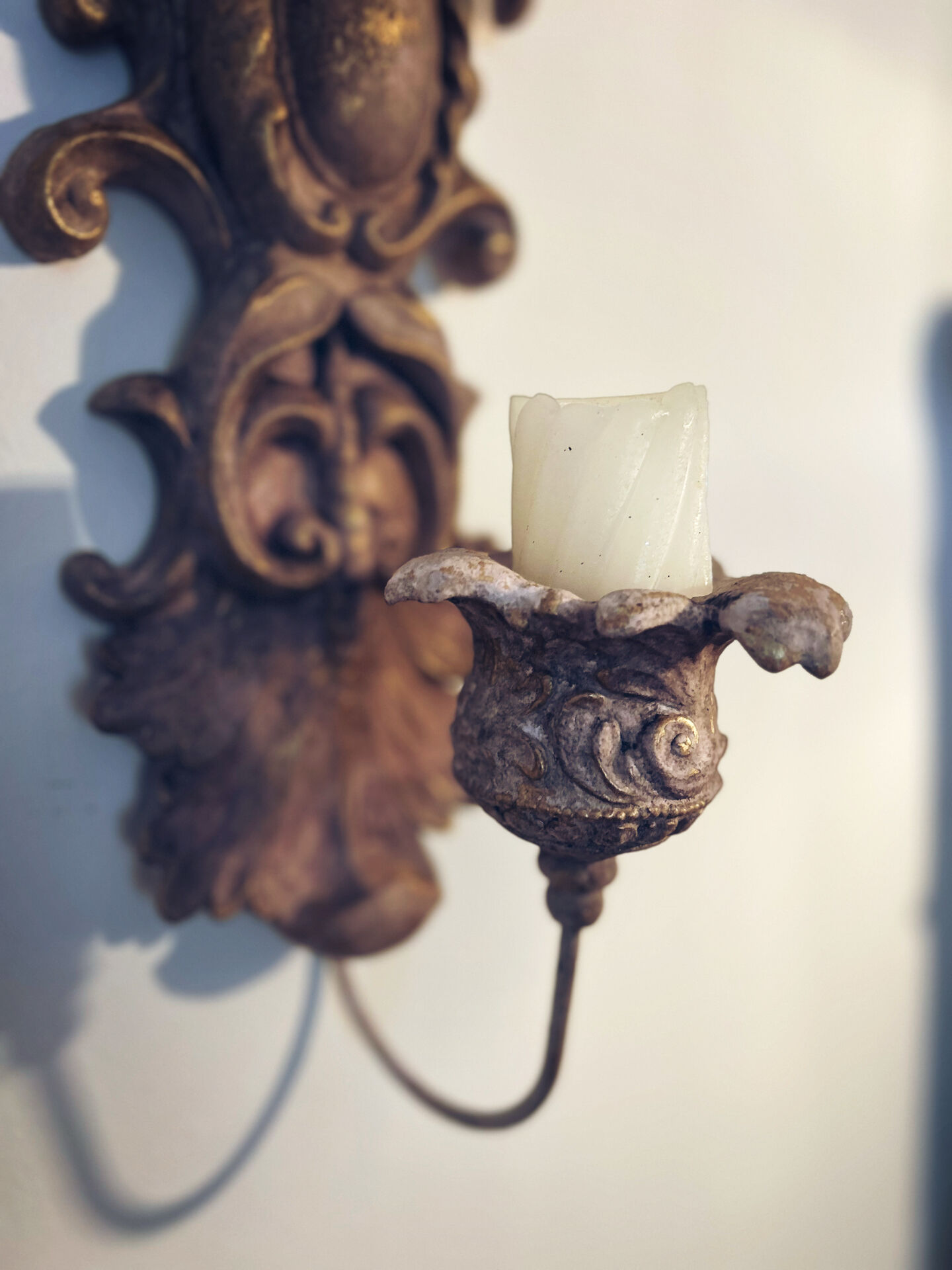 Incredible patinated wall candle holder