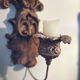 Incredible patinated wall candle holder