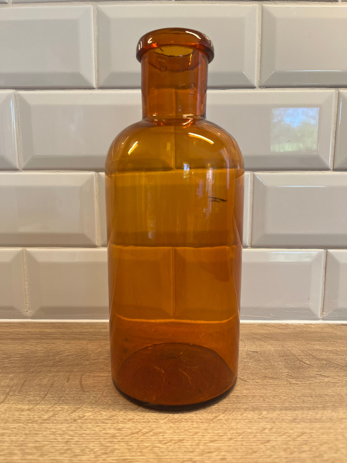 Amber glass bottle vase