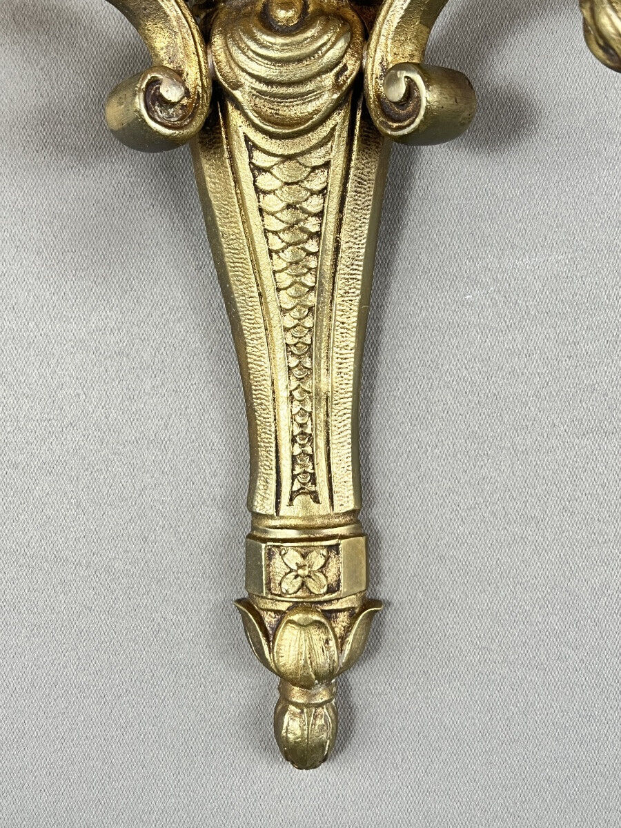 Set of four bronze wall sconces, Louis XVI style, 20th century.
