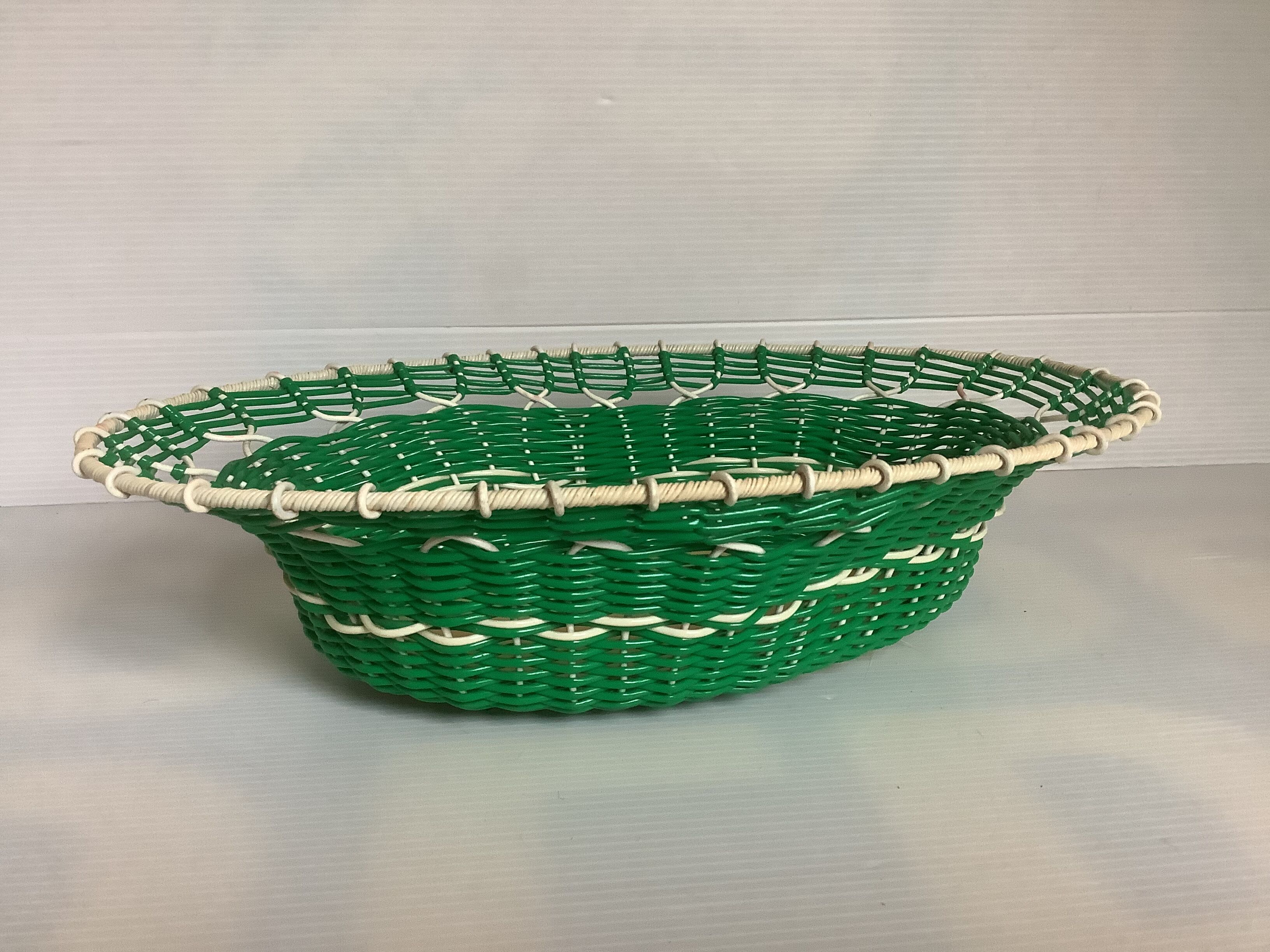 Old green scoubidou basket