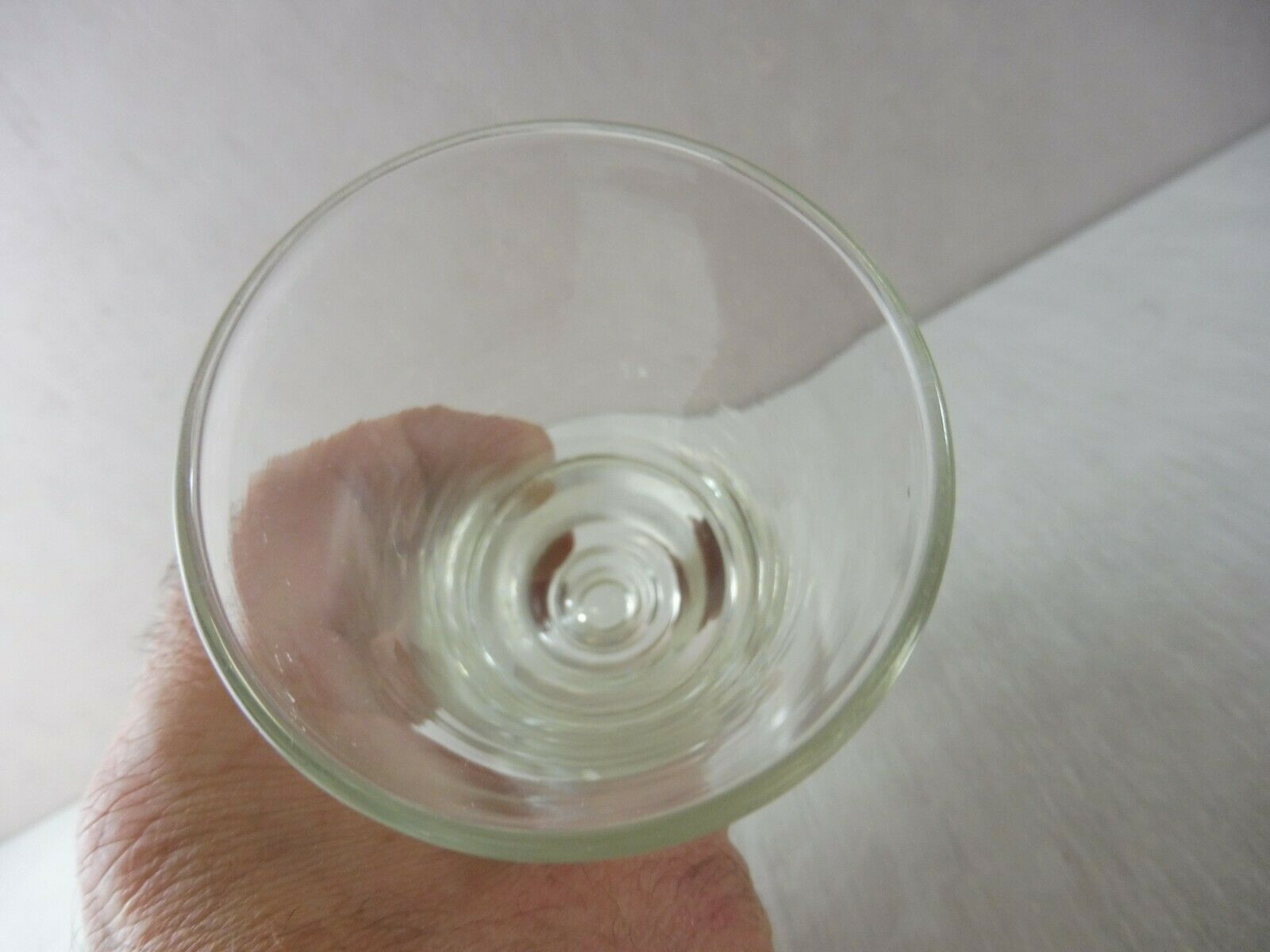 Old wormwood glass in molded glass, in thick glass