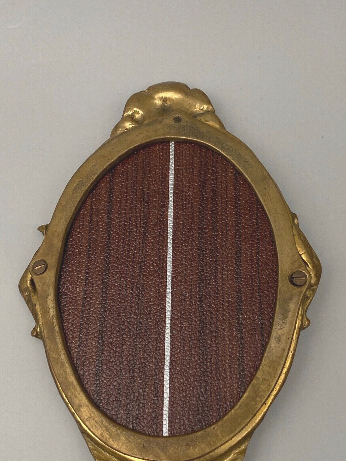 Bronze hand face of the middle XXe decor d'angelot