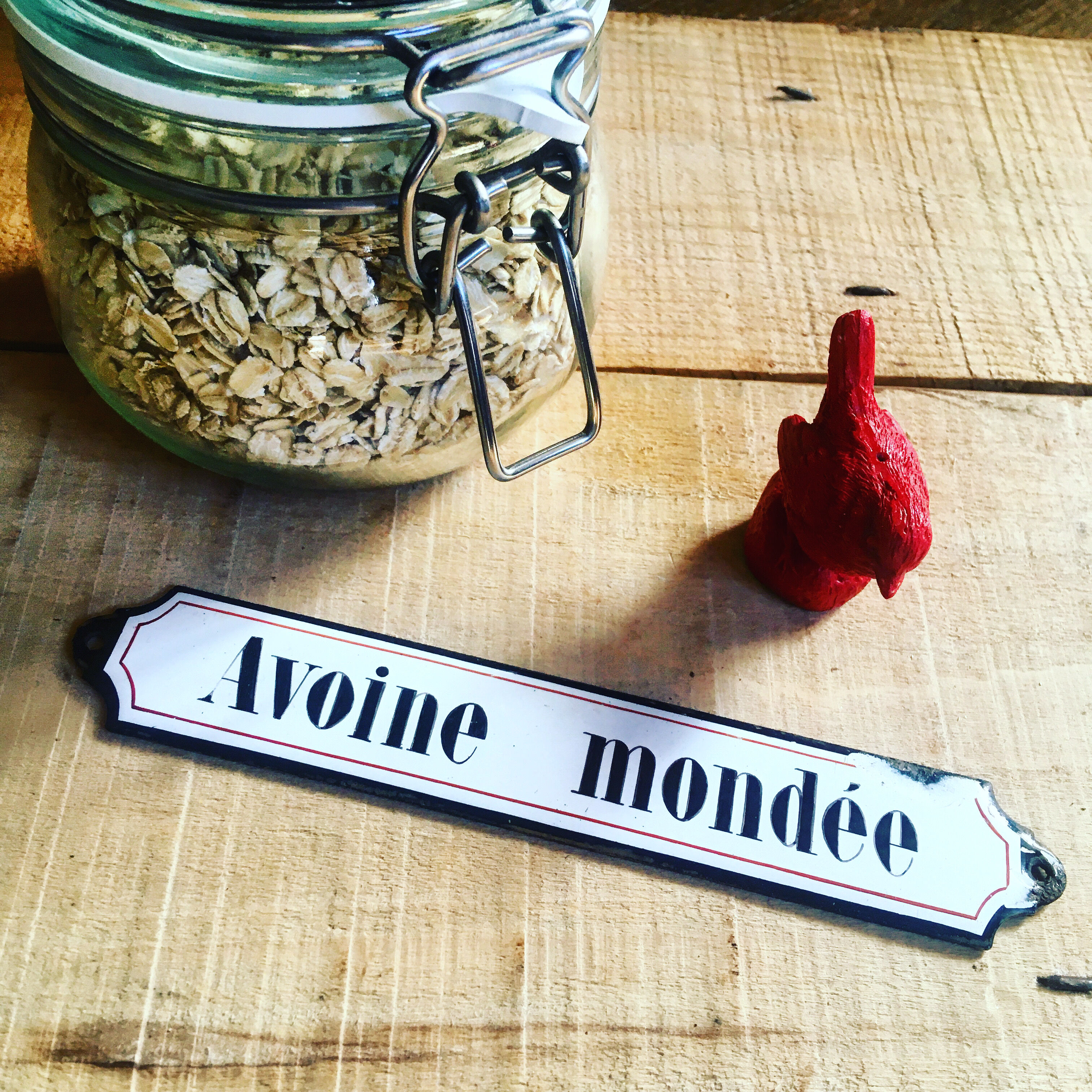 Ancient enamelplate of seed or grocery store. Furniture by trade. 1900s/1910s.