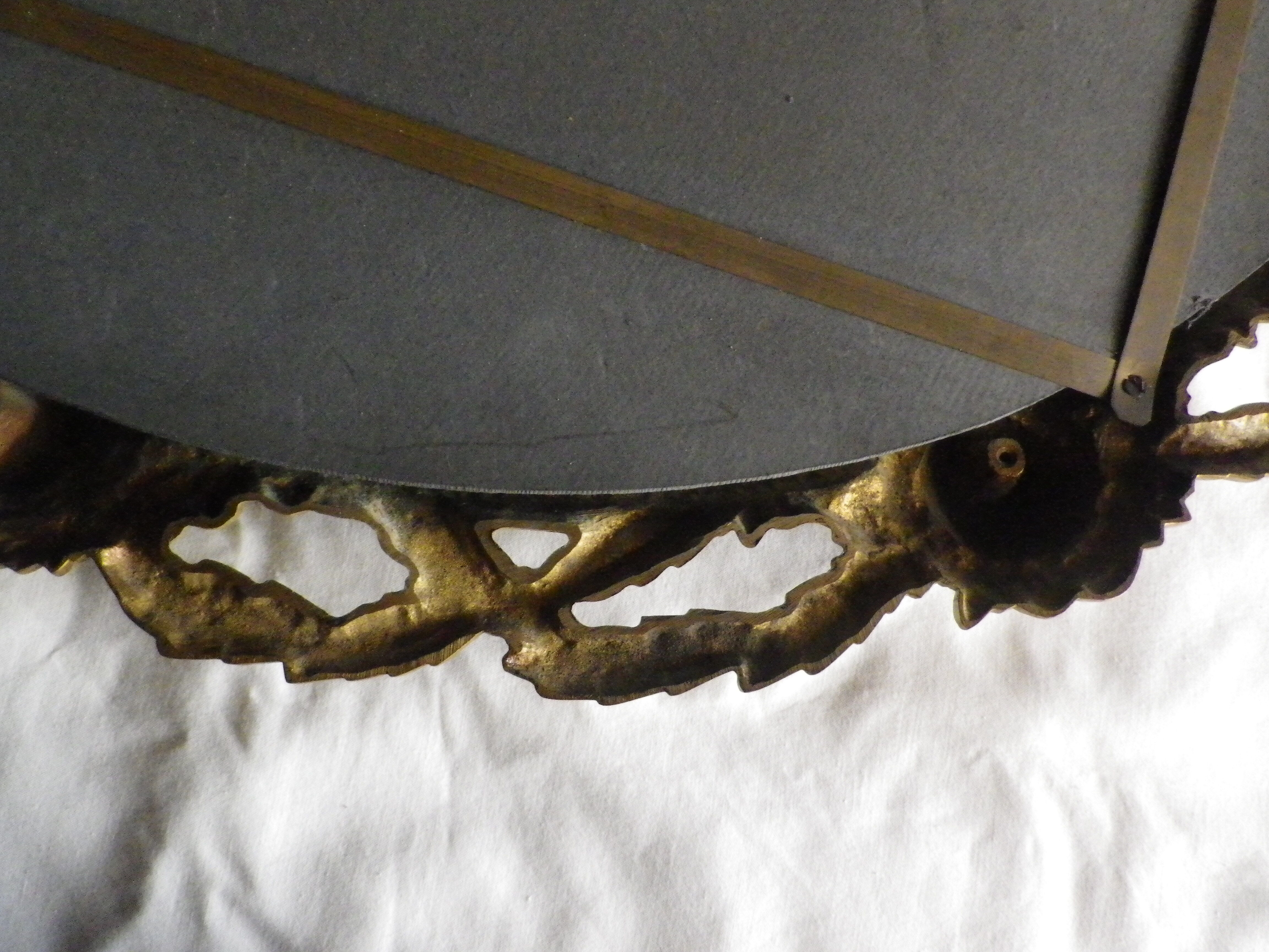 Bronze mirror gilded with roses, 72 cm