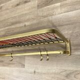 Coat rack with scoubidou shelf