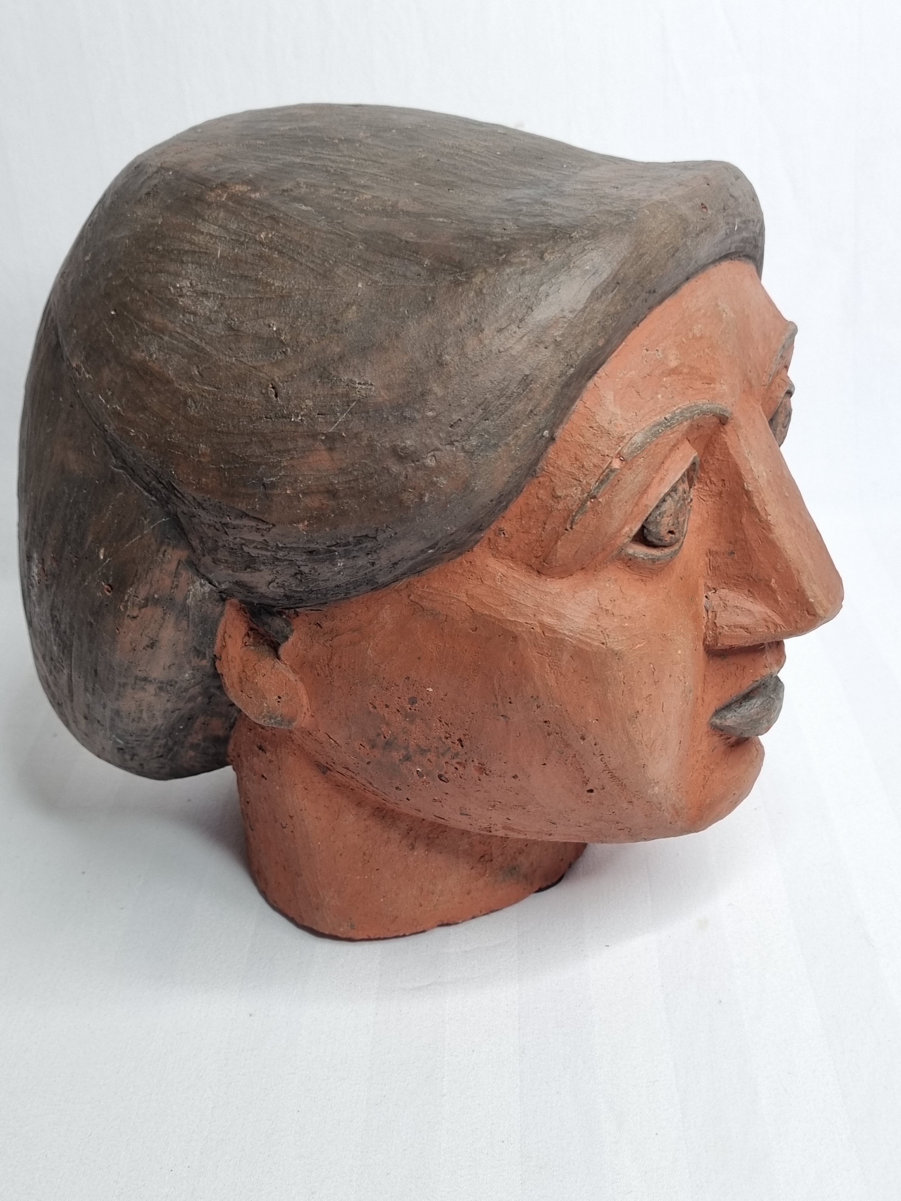 Set of 3 decorative women's heads in red terracotta