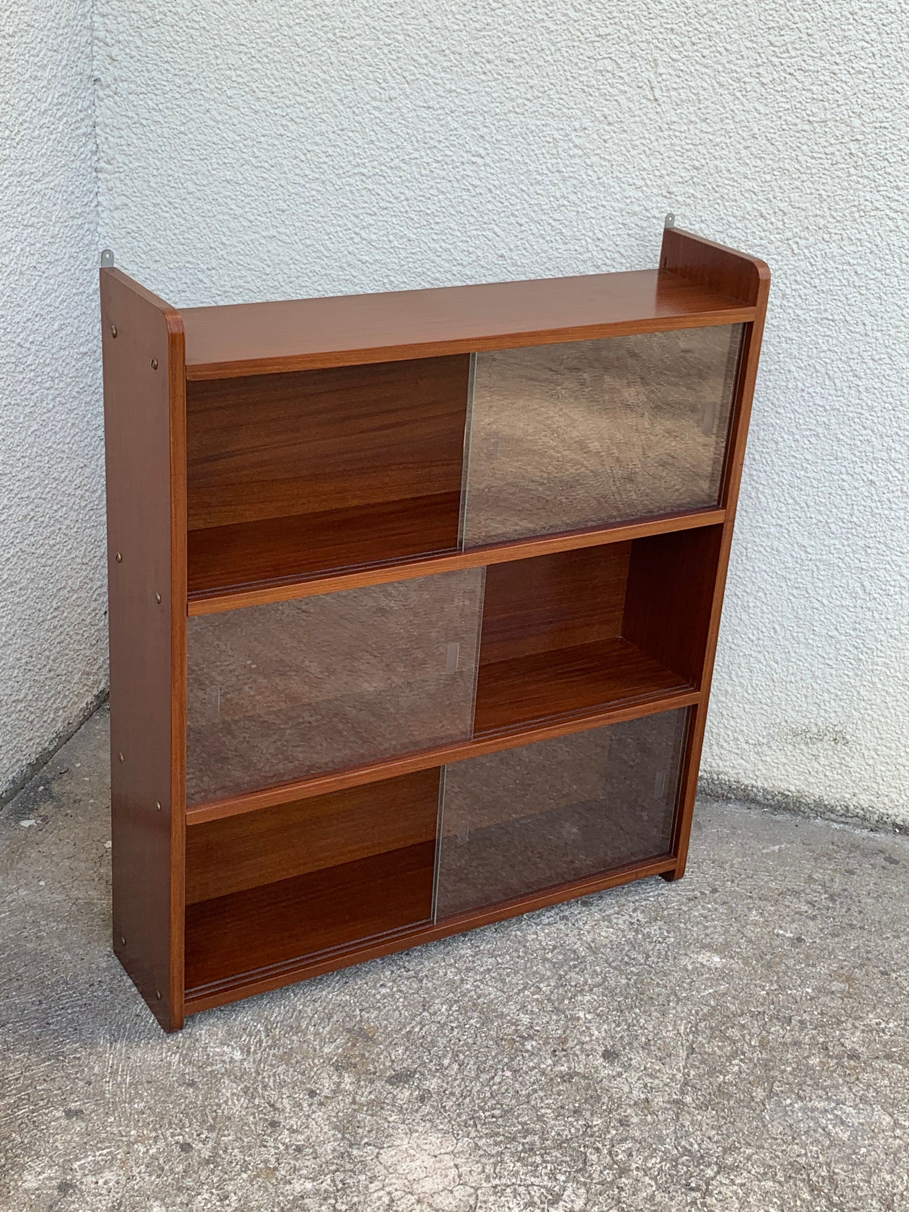 glass wall bookcase in vintage teak 1950