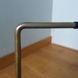 Modernist magazine rack in the style of Jacques Adnet