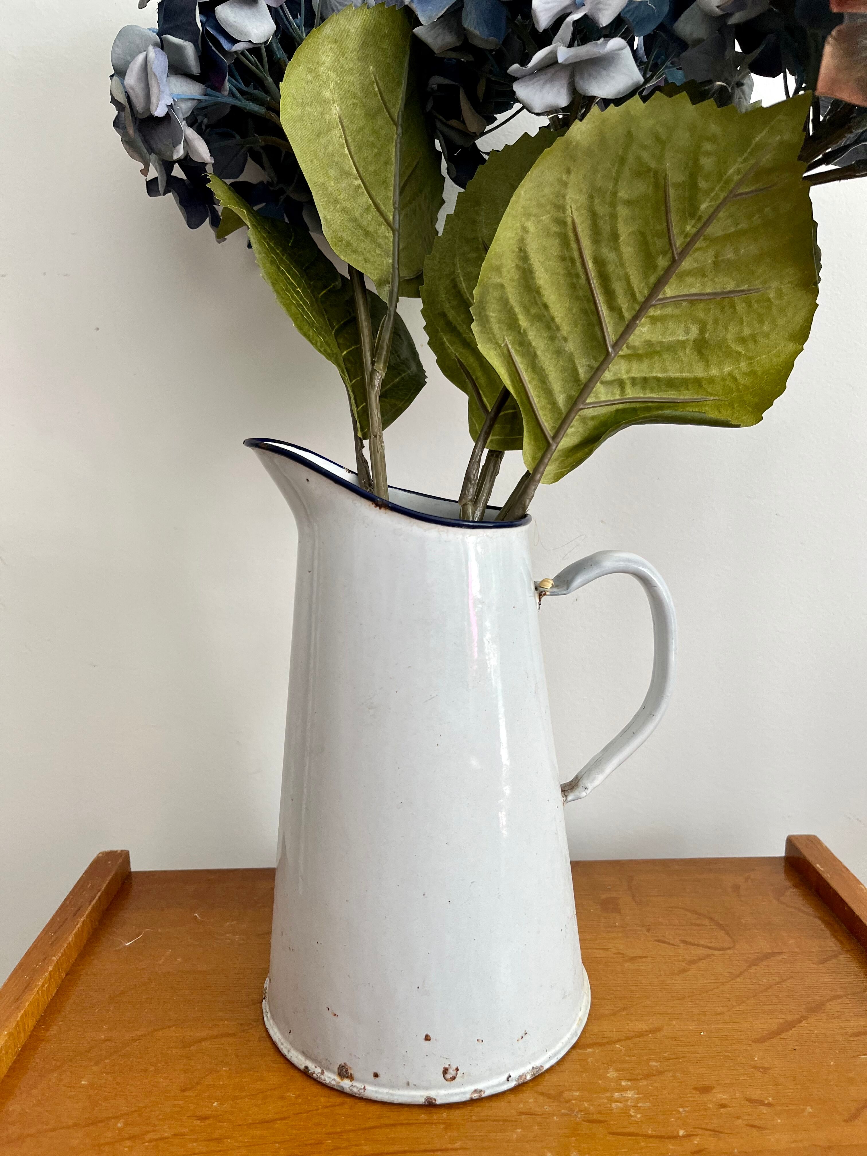 Antique enamelled broc vase