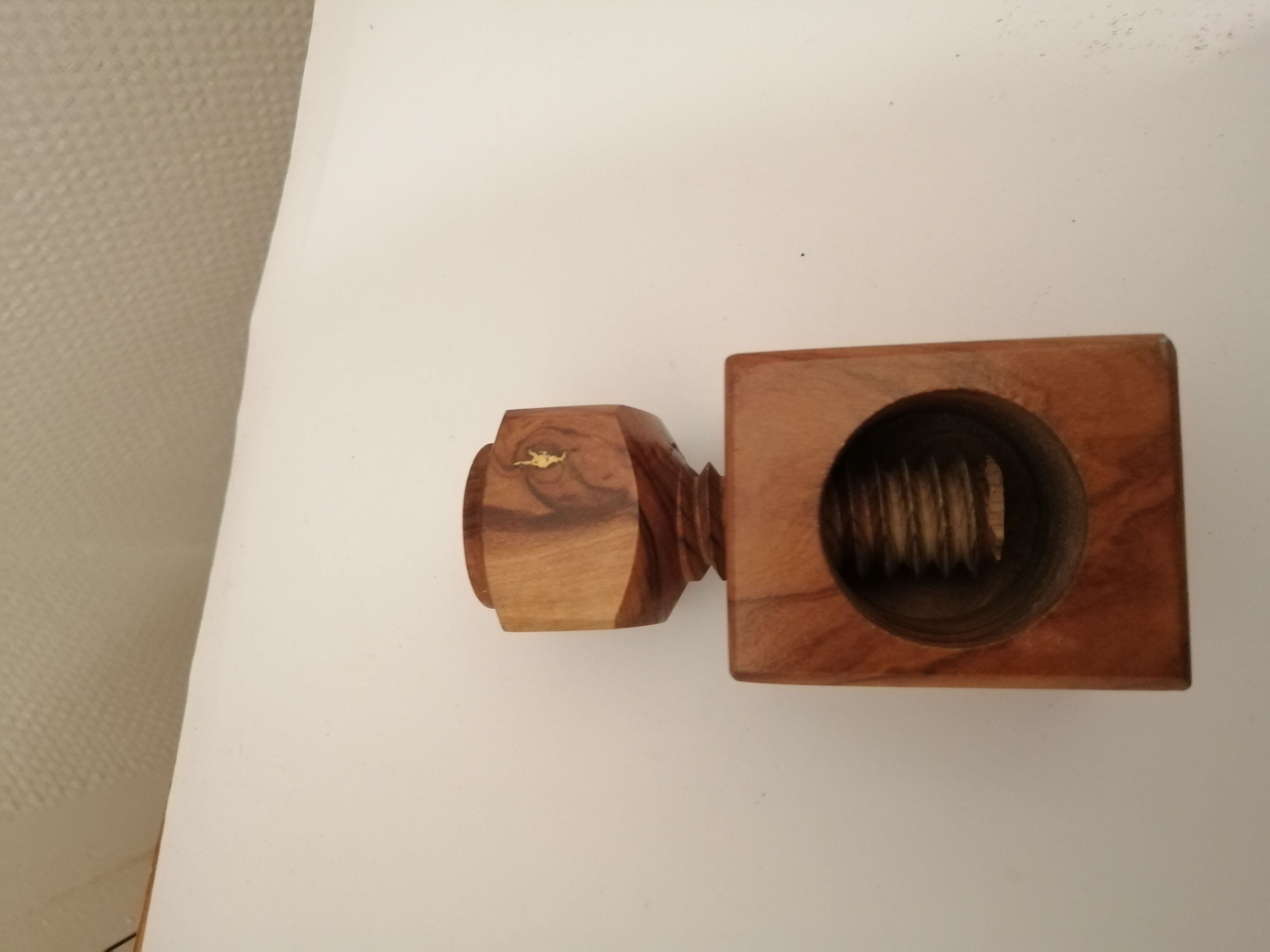 Nut and hazelnut nutcracker in olive wood