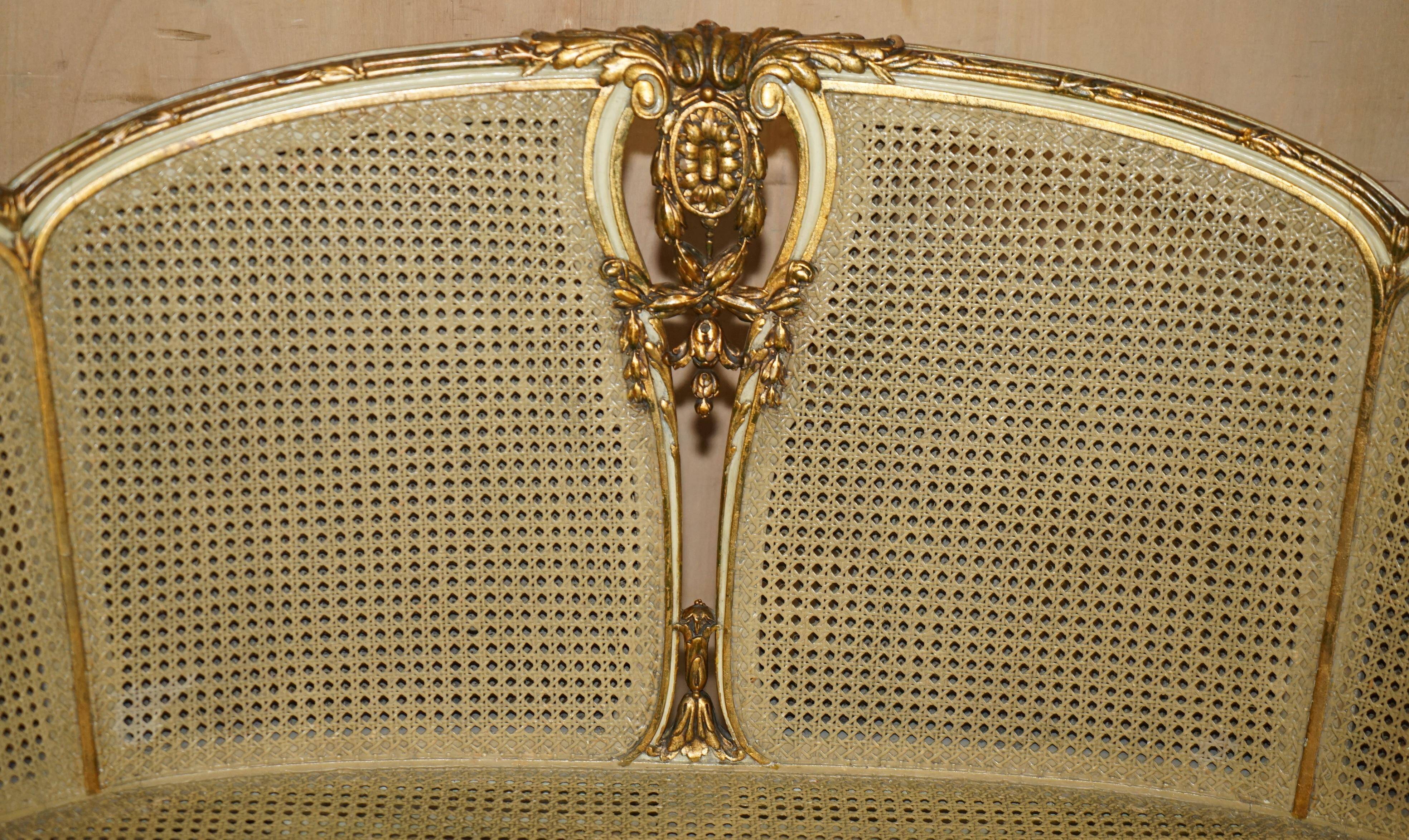 Louis XVI Bergère canapé in gilded wood with double caning