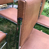 Skai and chrome chairs