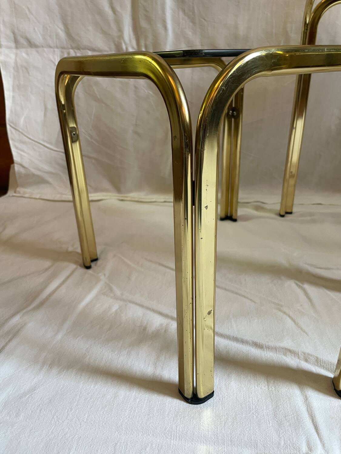 Brass and smoked glass nesting tables