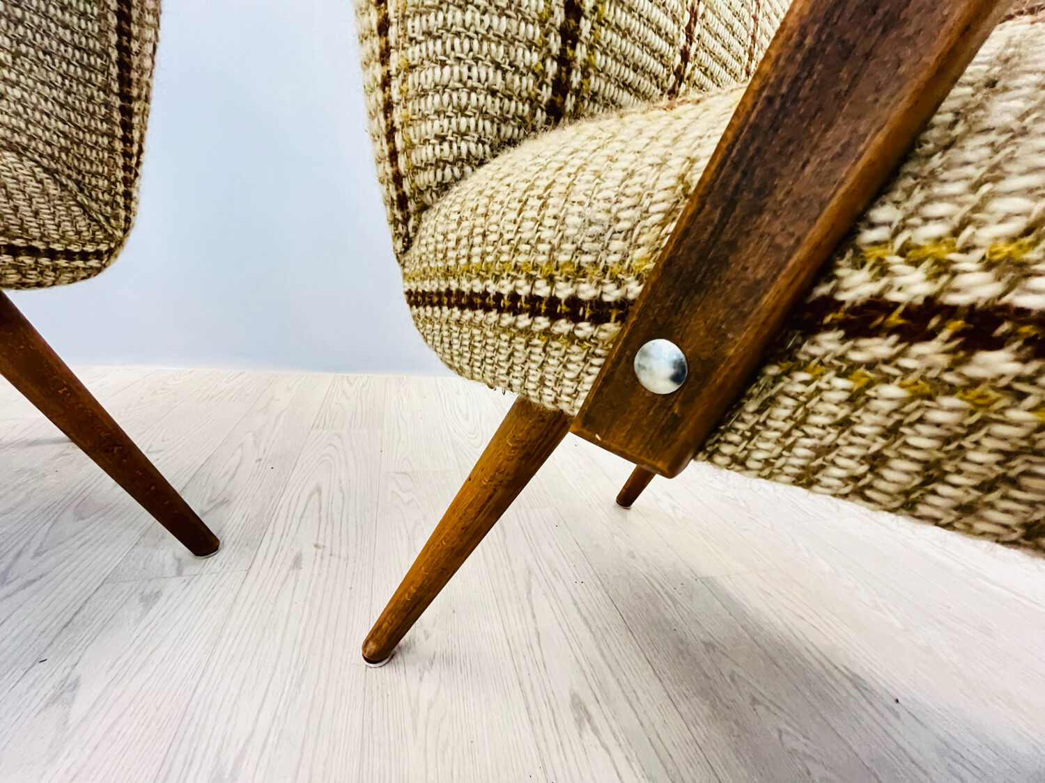A pair vintage cocktail chairs with stripes and metal screws