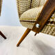 A pair vintage cocktail chairs with stripes and metal screws