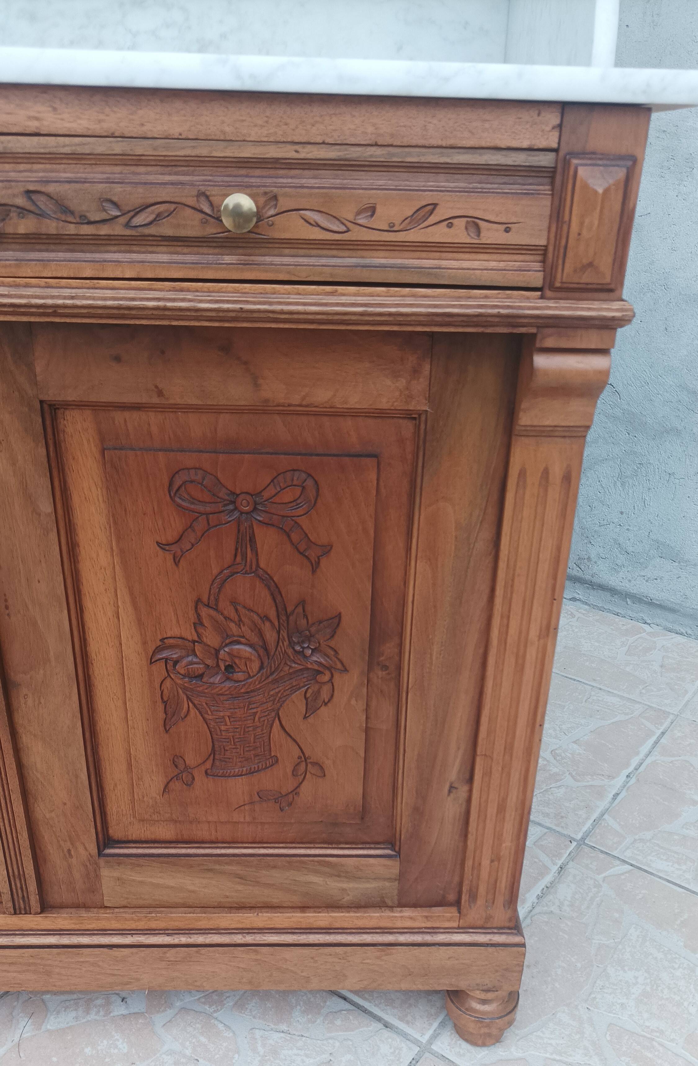 Antique walnut and white marble bathroom cabinet