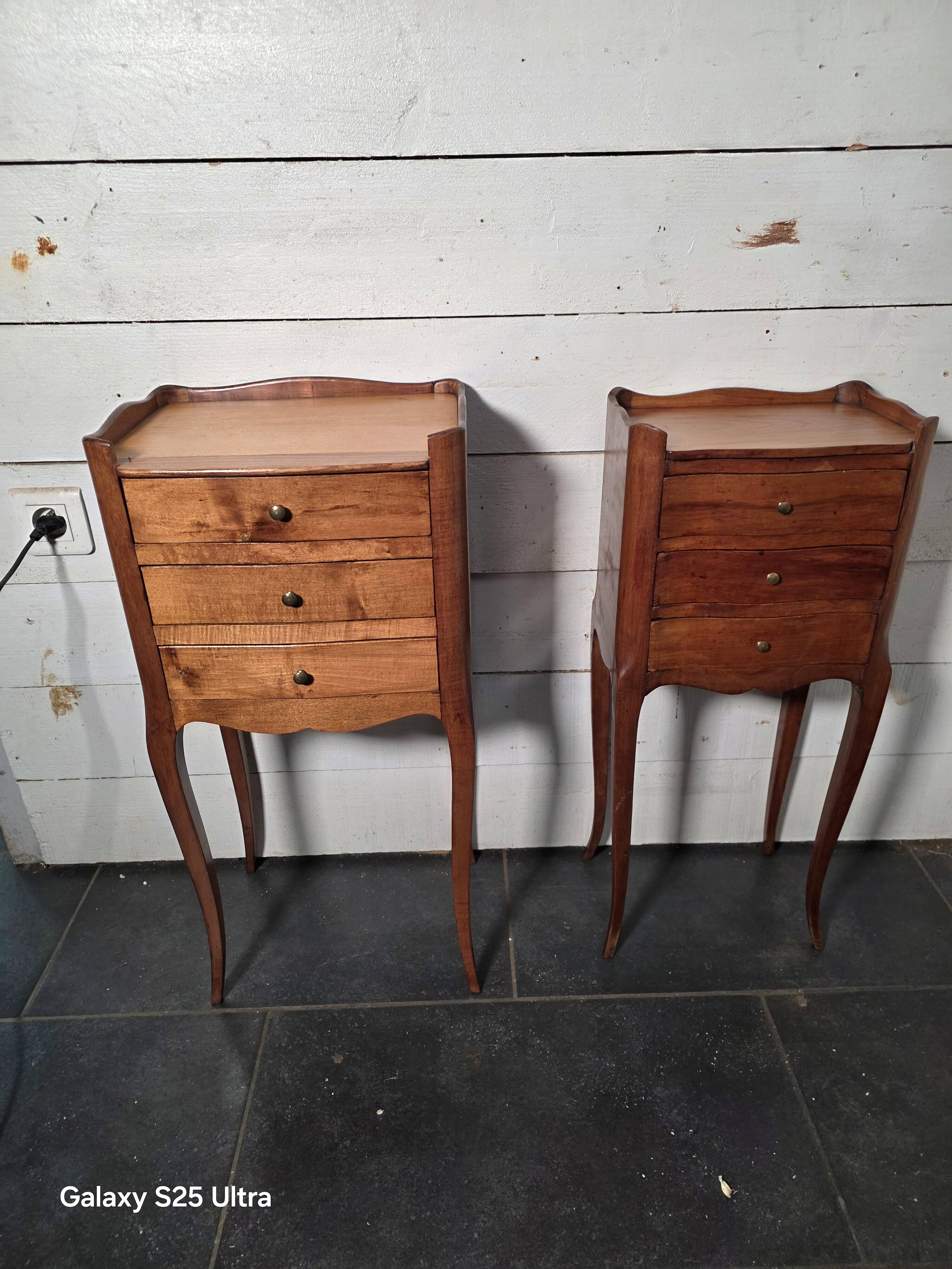 Pair of Louis XV style bedside tables in cherry wood.
