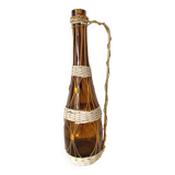 Amber glass bottle and scoubidou