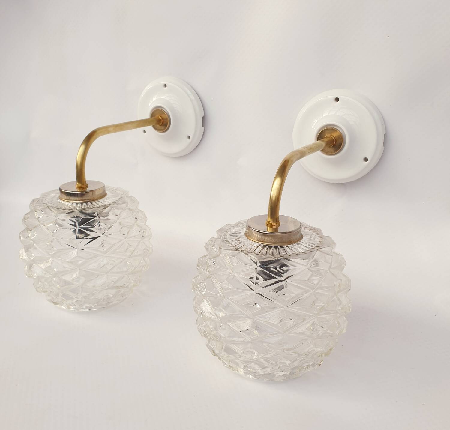 Swan neck and glass wall lights
