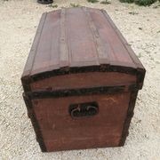 Old bombed travel trunk