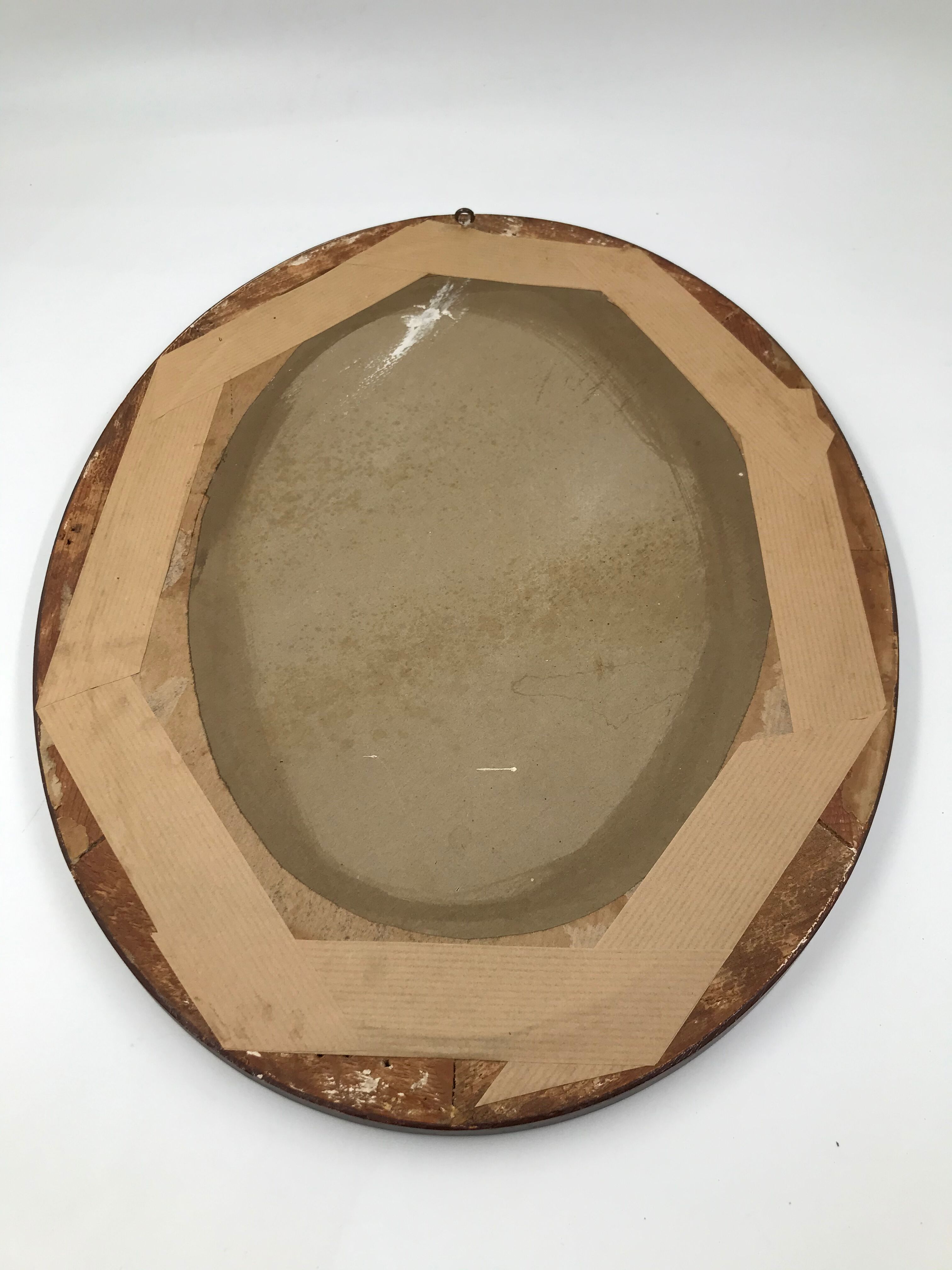 Miroir ovale en bois et décor placage 35x45cm