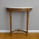 Console demie lune de style Louis XVI en bois sculpté