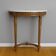 Console demie lune de style Louis XVI en bois sculpté