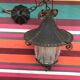 Old black forged iron suspension - vintage moulded glass reflector