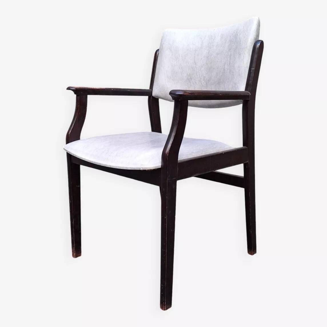 Wooden armchair and faux leather.