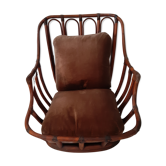 Fauteuil rotin des années 60 ras du sol