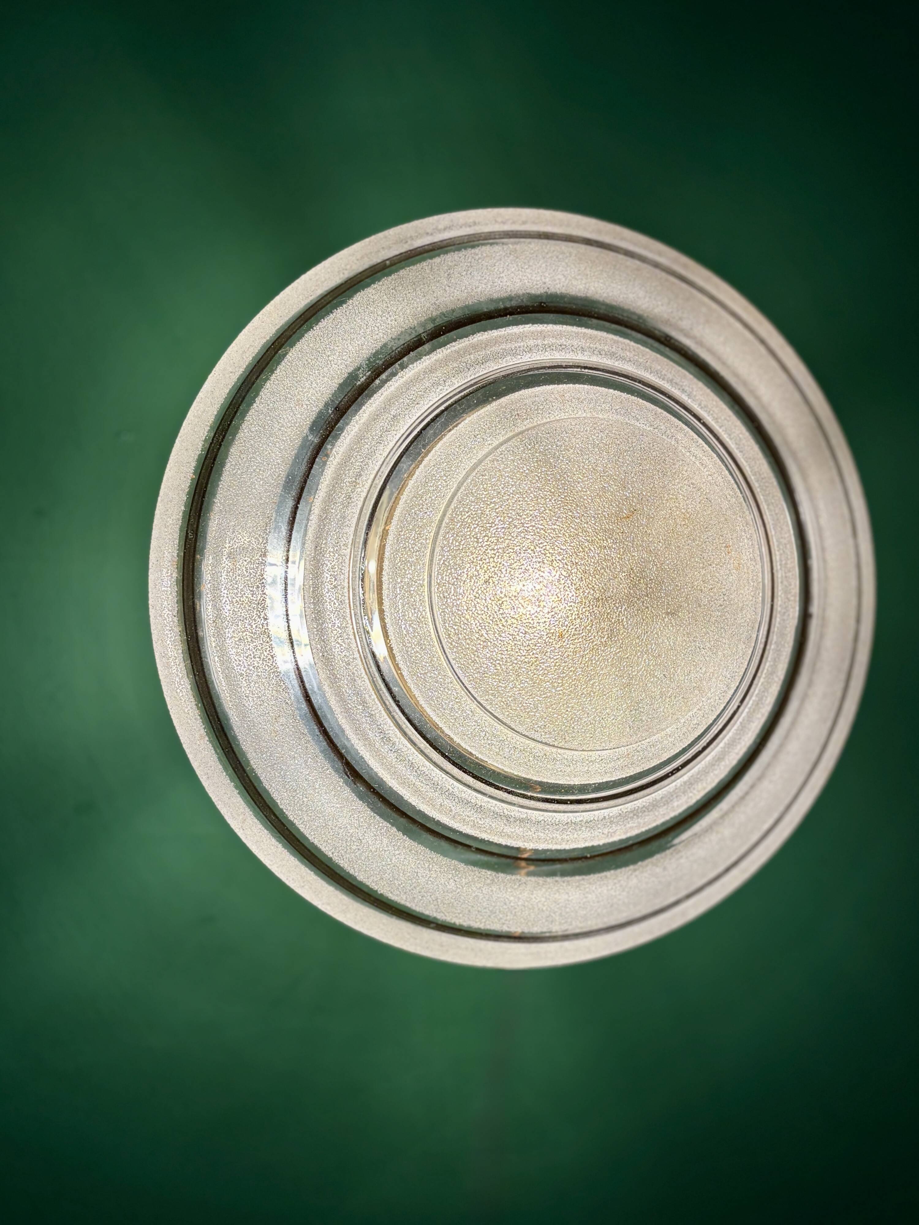 Old glass globe wall/ceiling light in frosted white and gold.