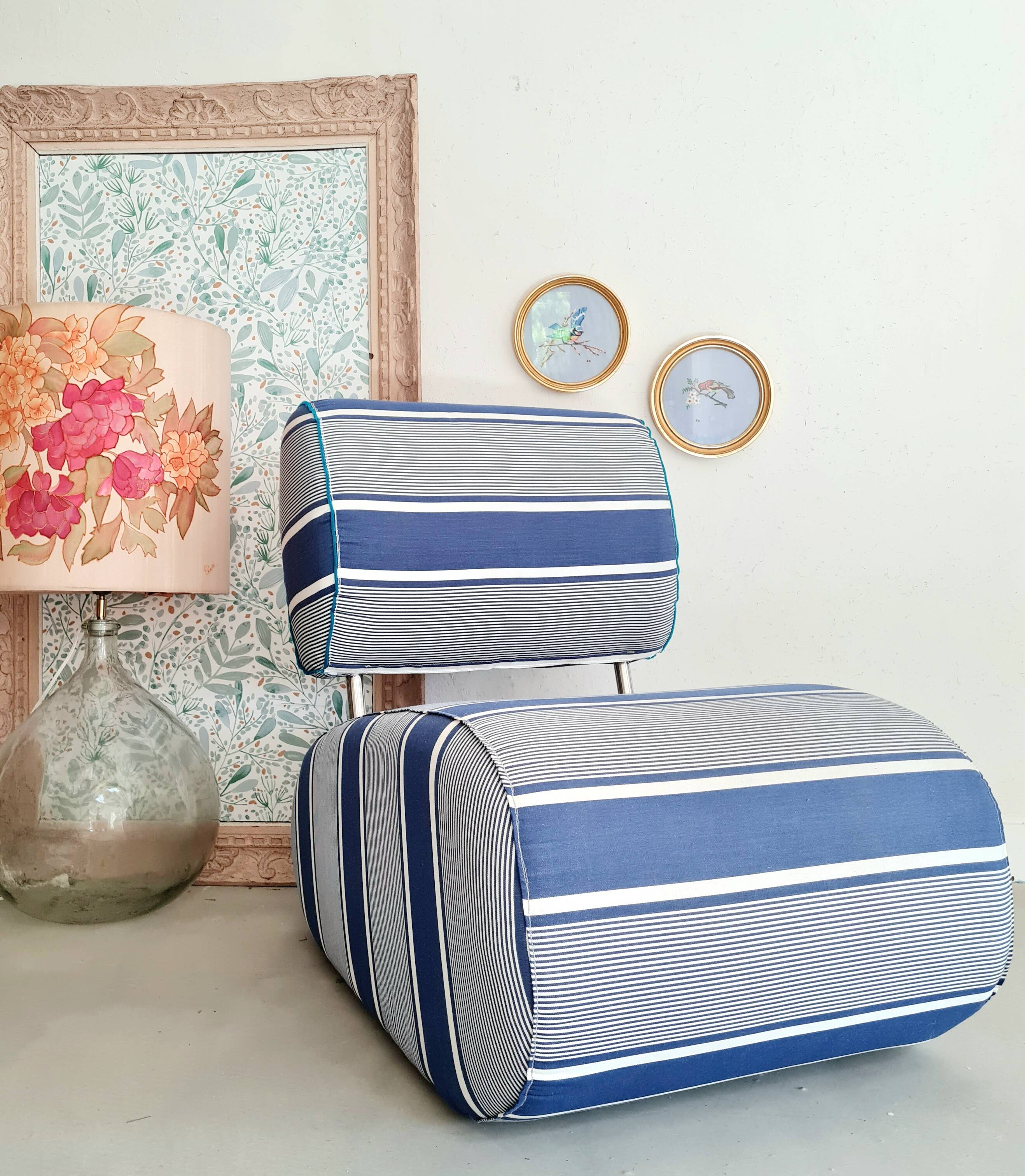 Curved armchair with blue and white stripes