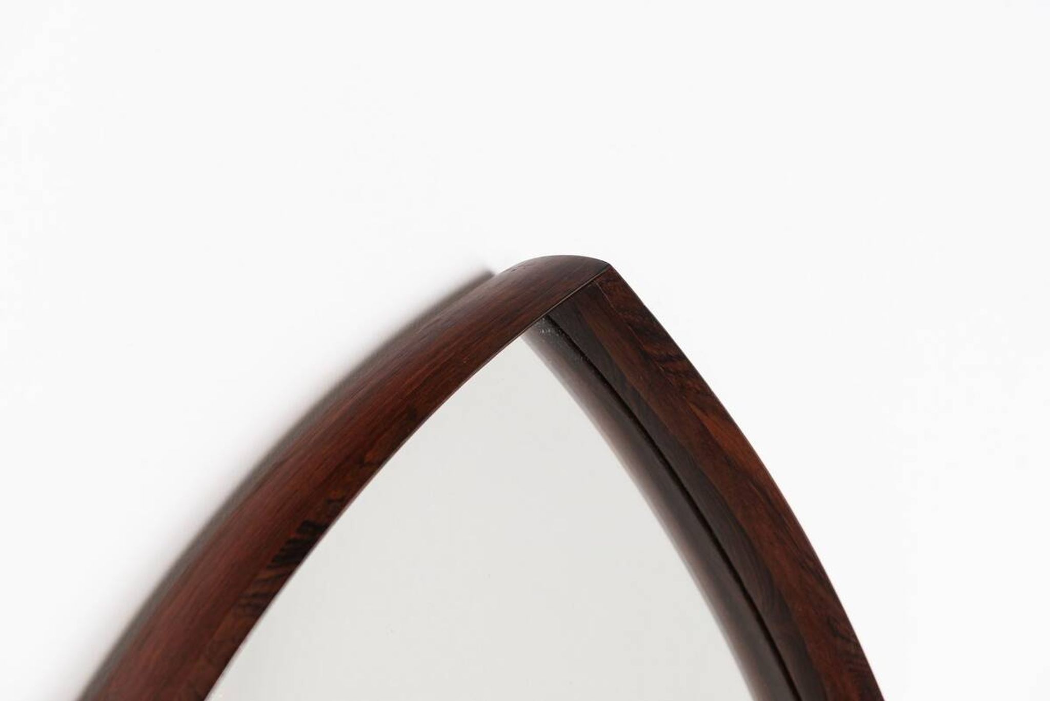Thomas Poss Eferfolger wall mirror in rosewood triangular Denmark 1960
