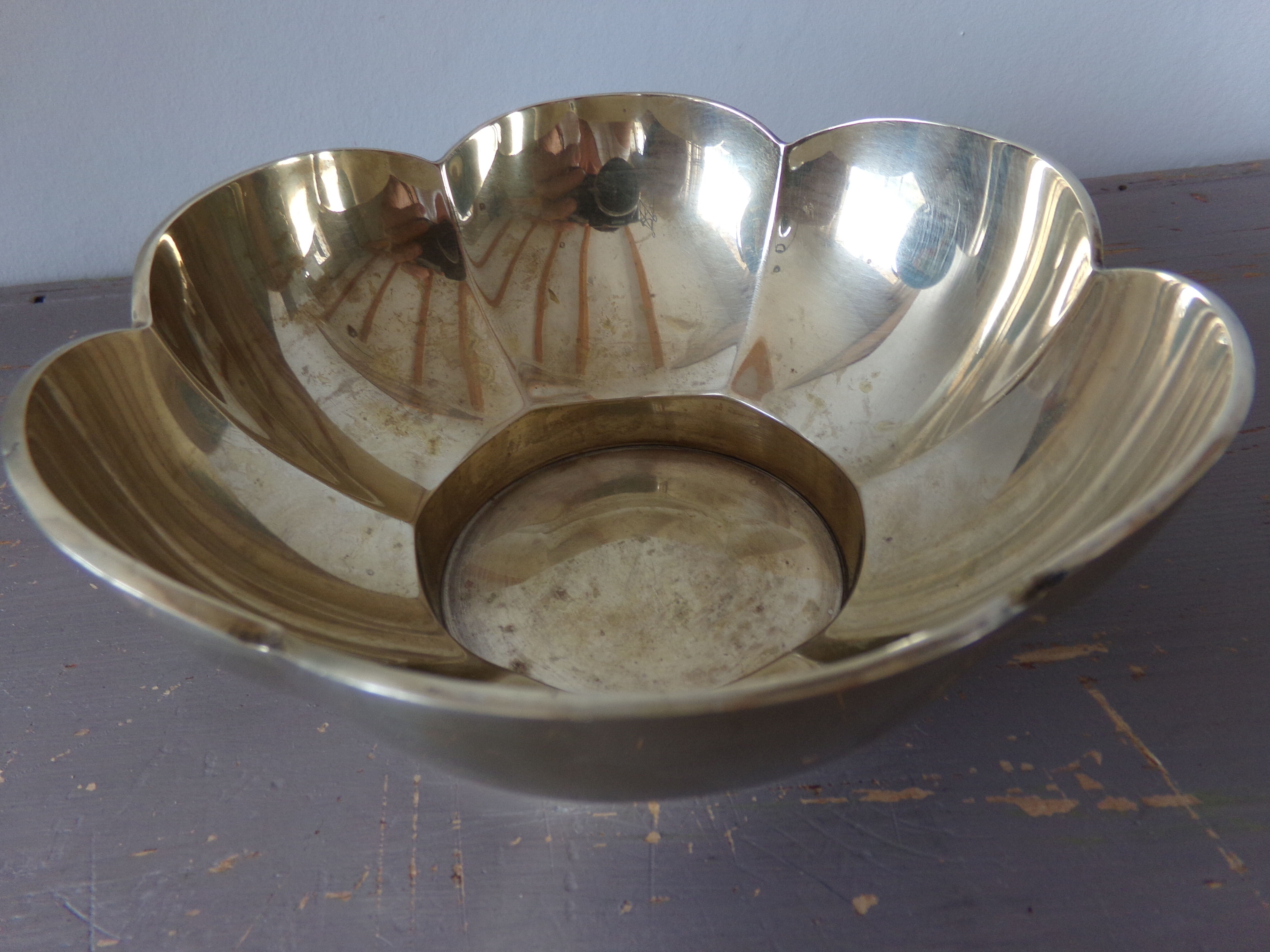 Empty-pocket cut in vintage brass