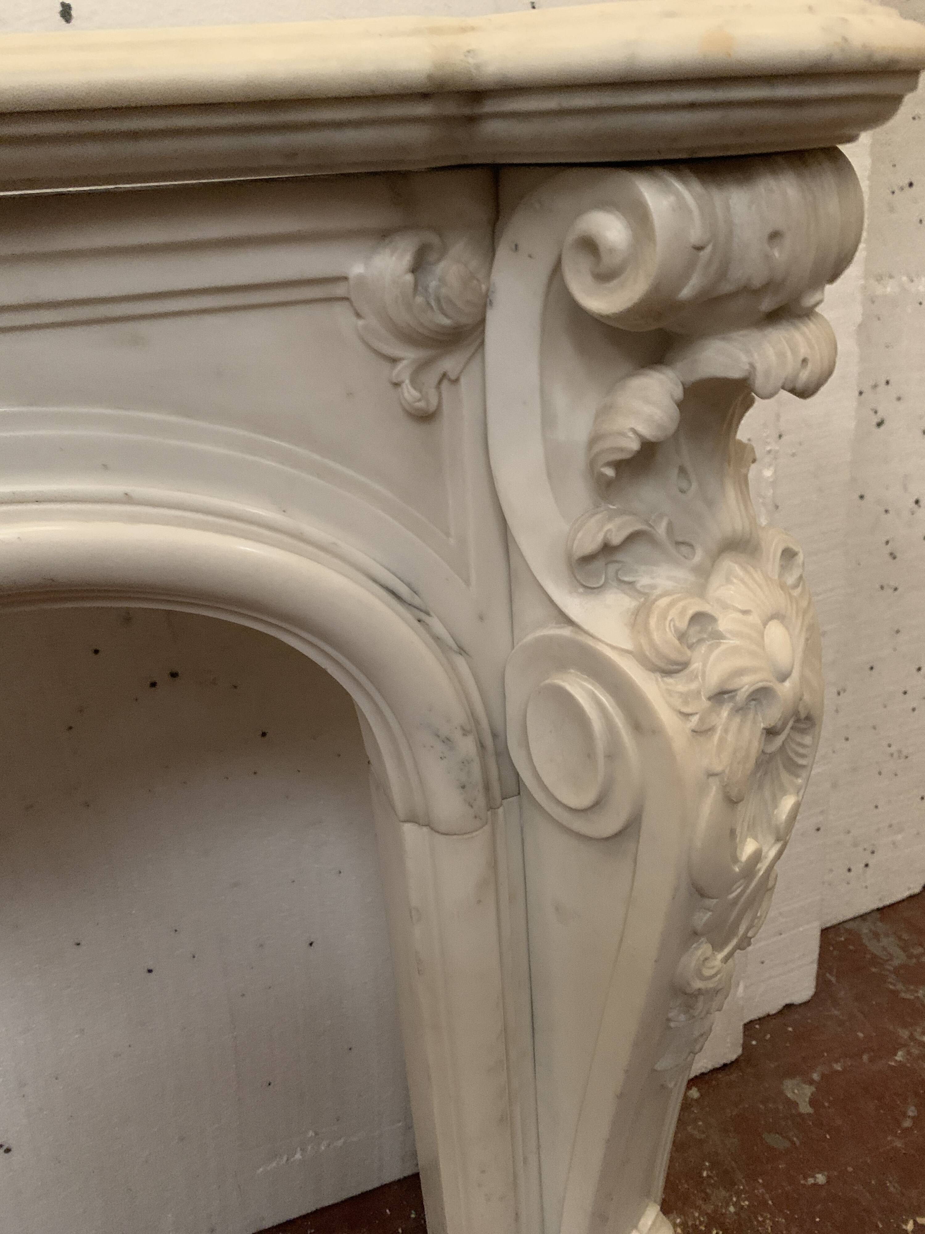 Louis XV style fireplace in white Carrara marble, 19th century