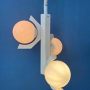 Mid-century white suspension with a bony design and opaline glass shade.