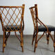 Pair of rattan and black skai bamboo chairs, 60s