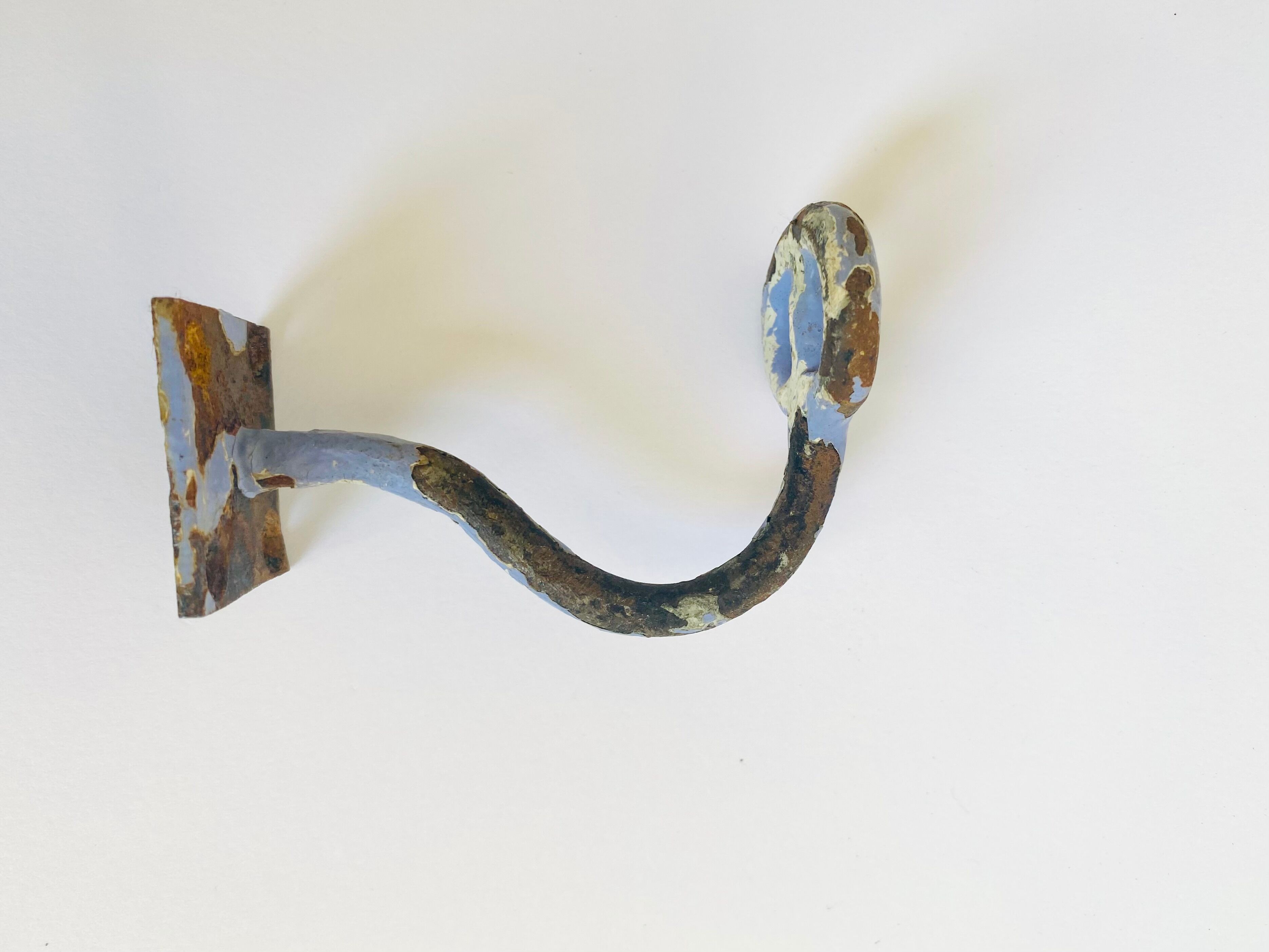 Enamelled cast iron hook