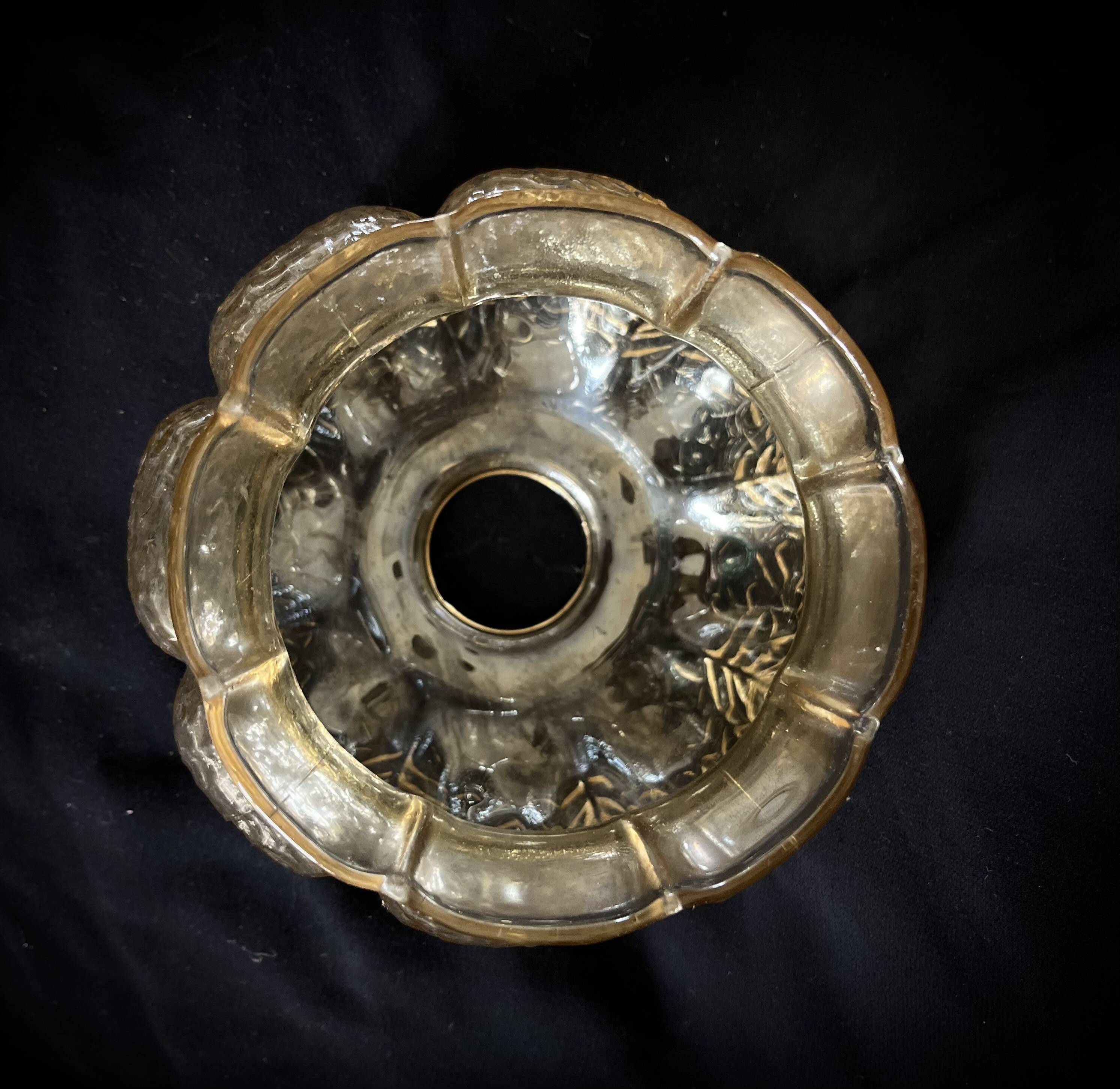 Small glass ball pendant light with amber plant effect