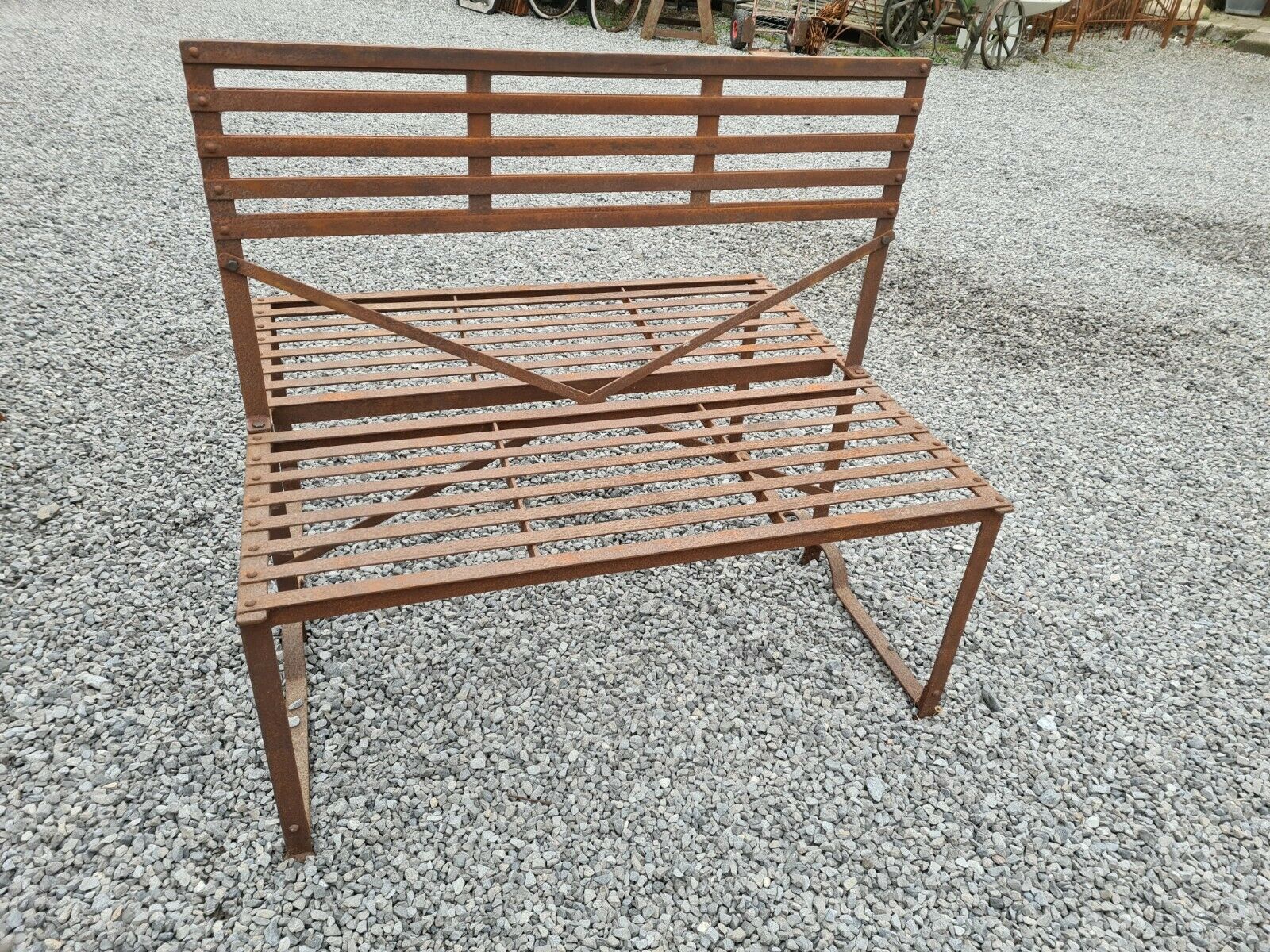 Wrought iron back-to-back garden bench