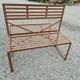 Wrought iron back-to-back garden bench