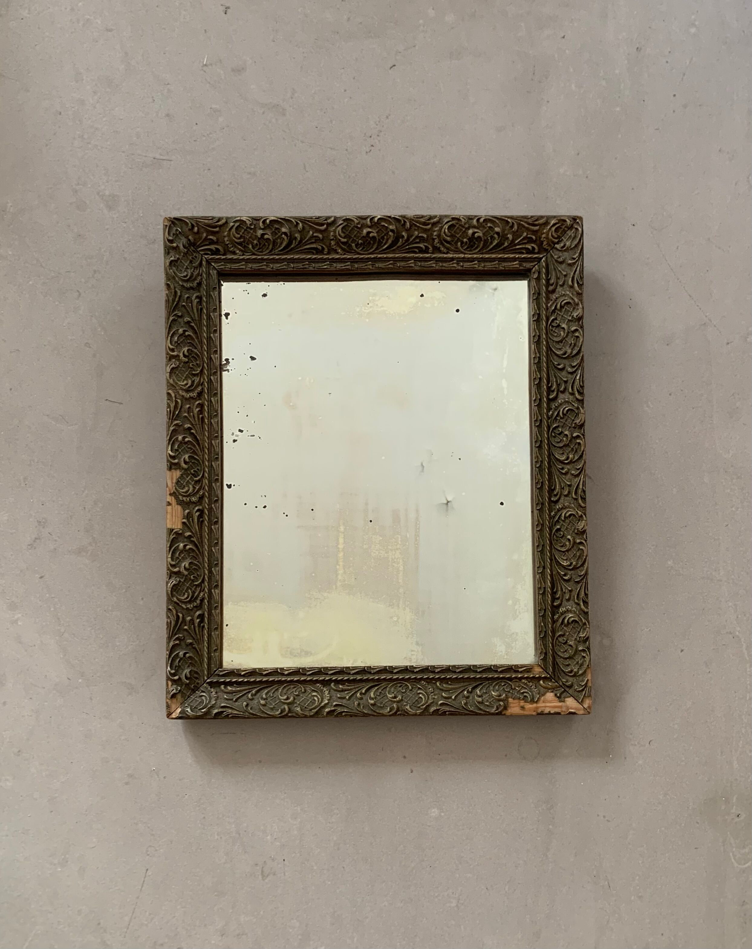 Old stitched golden mirror