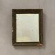 Old stitched golden mirror